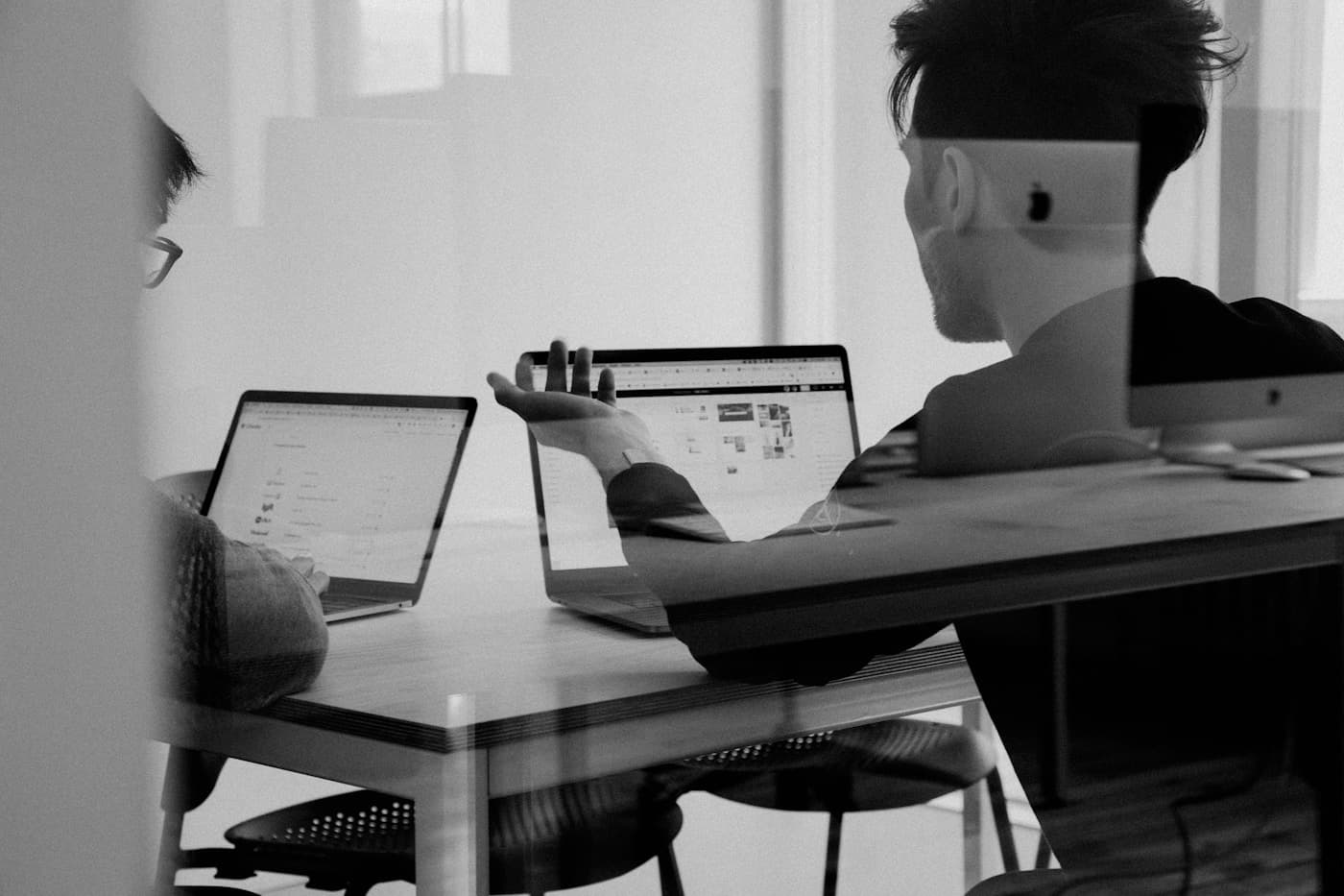 Enterprise team collaborating around a digital platform after successful implementation