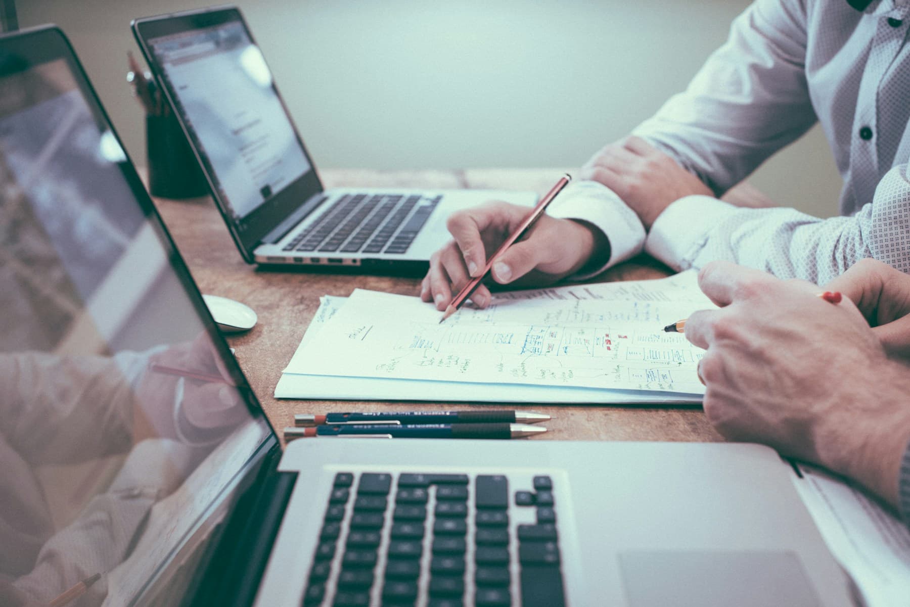Marketing strategist reviewing multiple disconnected content platforms