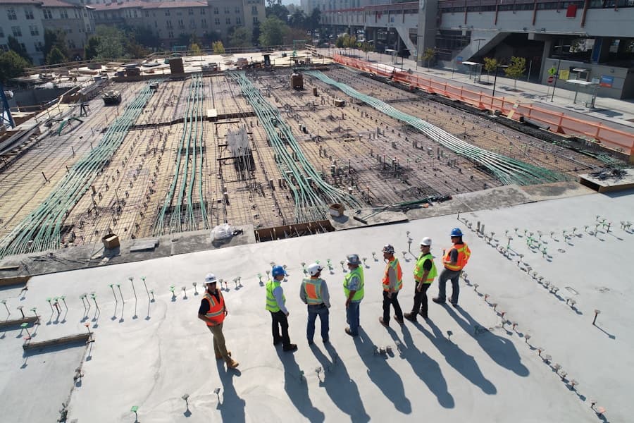 Engineering professionals reviewing technical documents and project specifications
