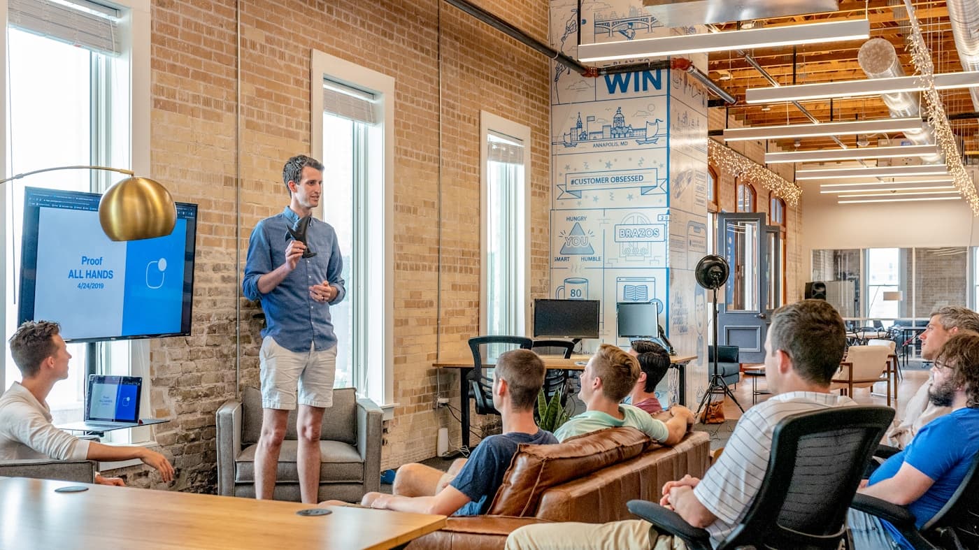 Business leaders reviewing spreadsheets and disconnected data sources during planning